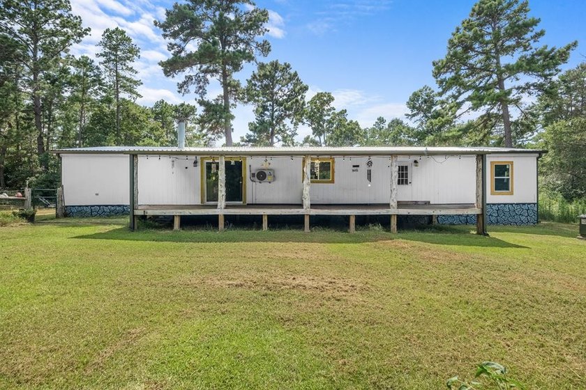 Tucked away among nearly 39 acres of towering timber, this East - photo 29