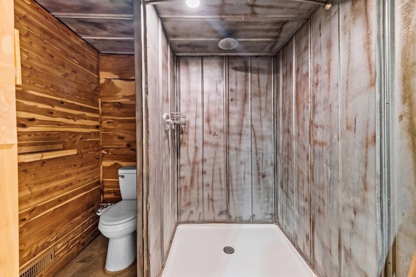 Tucked away among nearly 39 acres of towering timber, this East - photo 33
