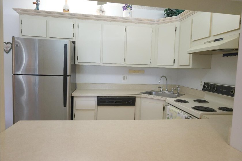 ADULT COMMUNITY 55+, Check out this well maintained second floor - photo 18