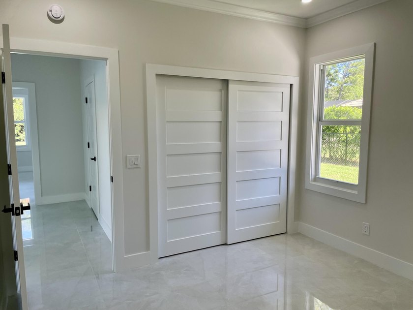 Welcome to this reimagined 4-bedroom, 3-bathroom, pool home in - photo 11