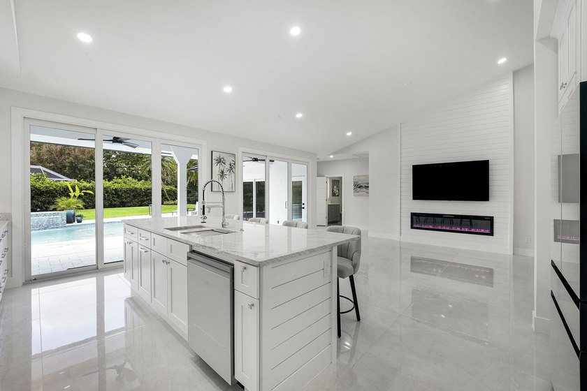 Welcome to this reimagined 4-bedroom, 3-bathroom, pool home in - photo 18