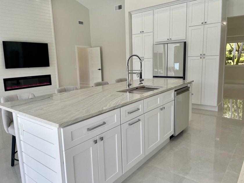 Welcome to this reimagined 4-bedroom, 3-bathroom, pool home in - photo 19