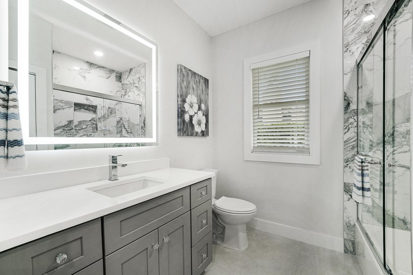 Welcome to this reimagined 4-bedroom, 3-bathroom, pool home in - photo 23