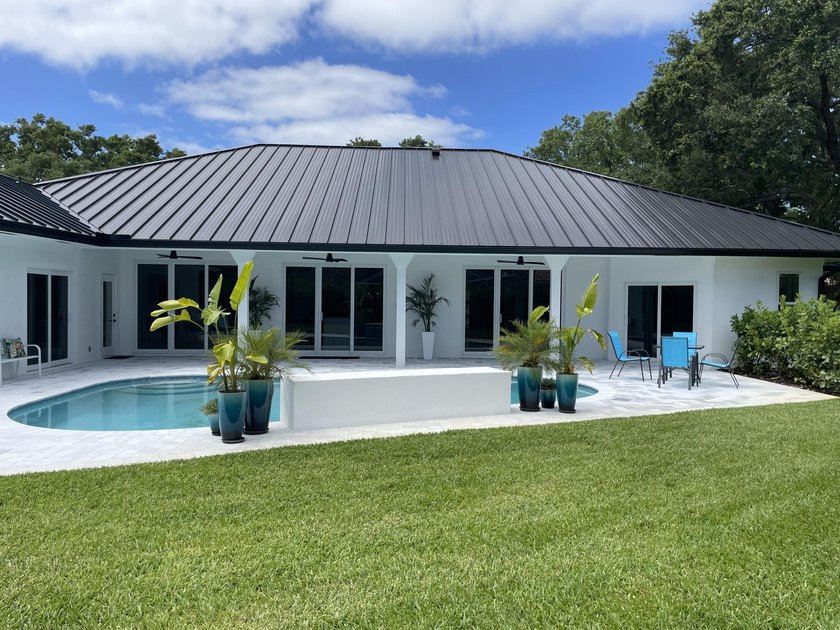 Welcome to this reimagined 4-bedroom, 3-bathroom, pool home in - photo 36