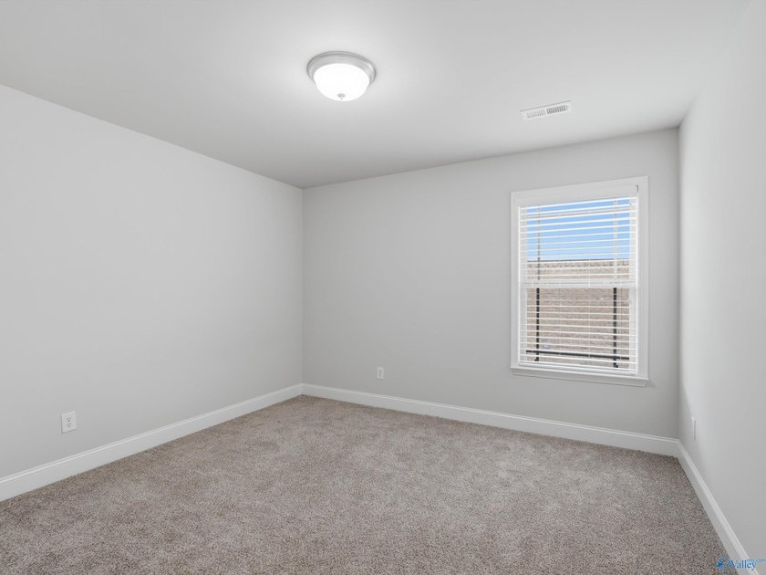 This home offers unbeatable convenience, just minutes from - photo 17