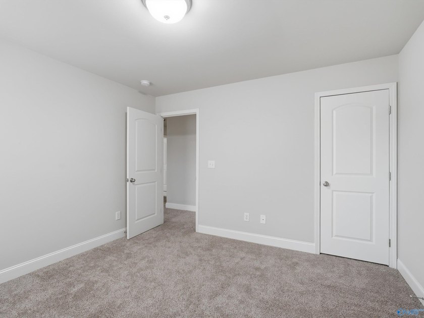 This home offers unbeatable convenience, just minutes from - photo 18