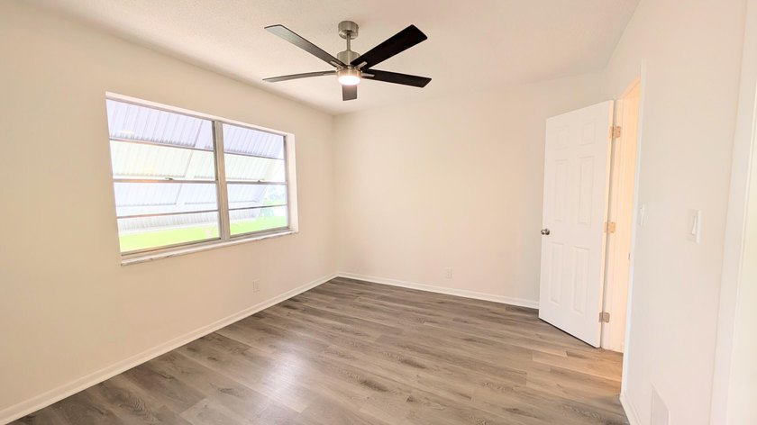 Don't miss this beautifully updated 2BR/1BA second-floor corner - photo 4