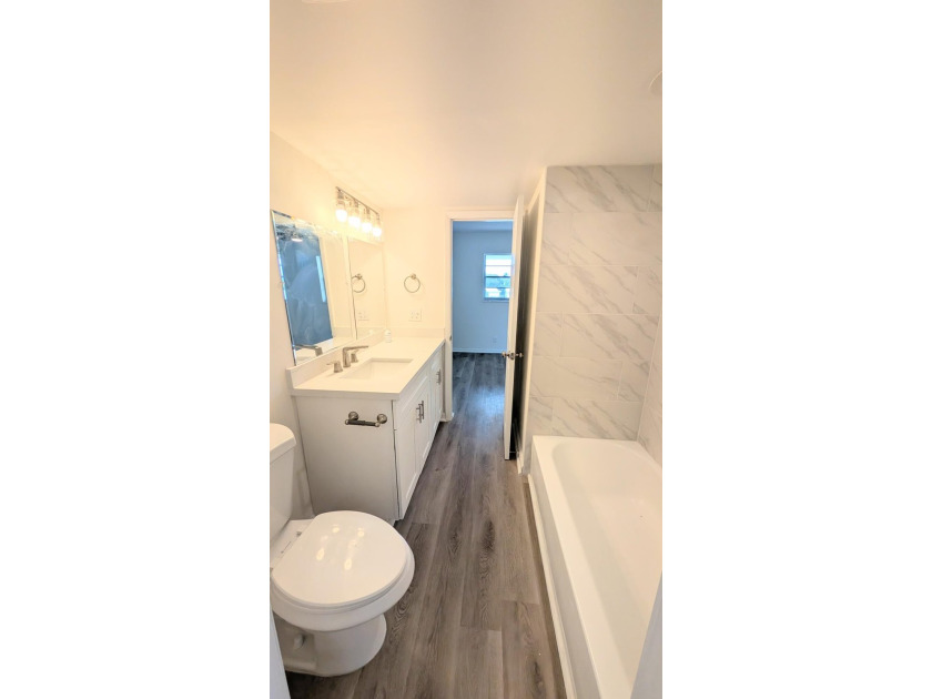 Don't miss this beautifully updated 2BR/1BA second-floor corner - photo 6