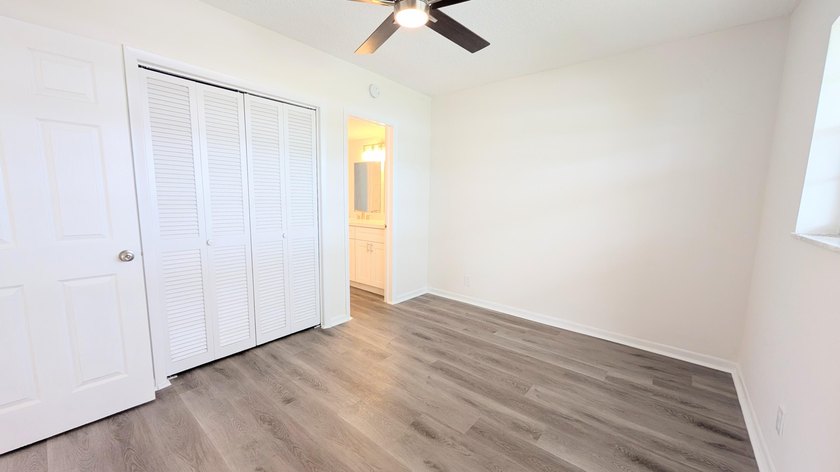 Don't miss this beautifully updated 2BR/1BA second-floor corner - photo 9