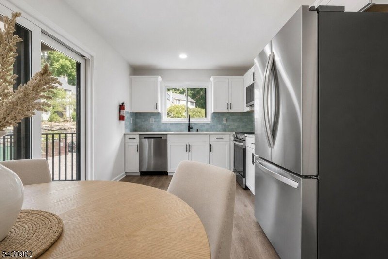 Turnkey fully renovated multi-level condo that checks every box! - photo 2