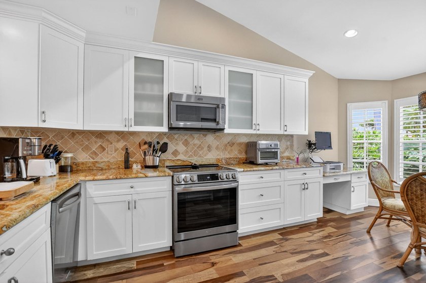 Discover this rarely available townhouse. Located in a 24hr - photo 3