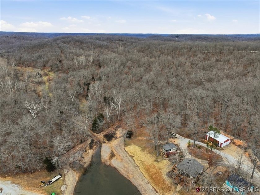 Interested in having BOTH acreage AND lake? This property - photo 24