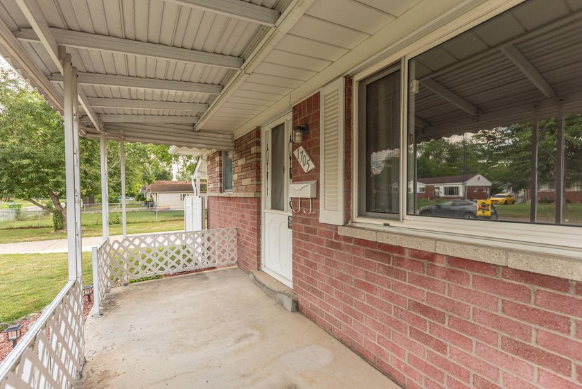 Quiet tree lined street this 3BR/2BA ranch home is located in a - photo 3