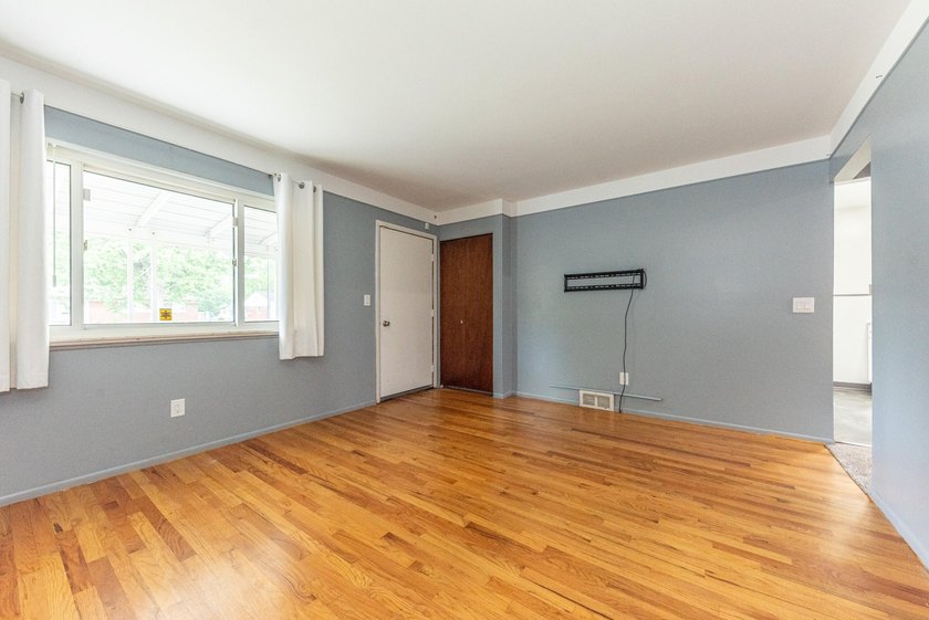Quiet tree lined street this 3BR/2BA ranch home is located in a - photo 6