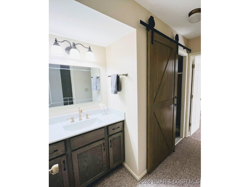 Discover your dream getaway at Lake Ozark! This spacious - photo 13