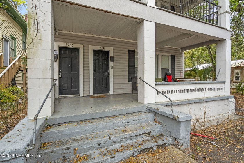 Unlock the potential of this versatile duplex located in a - photo 3