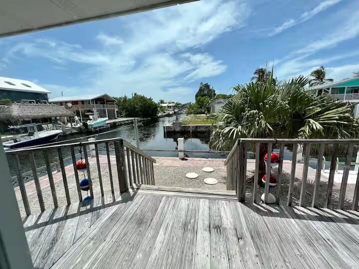 Bring your boats to this beautifully furnished canal front home - photo 11
