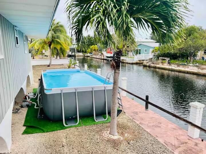 Bring your boats to this beautifully furnished canal front home - photo 12