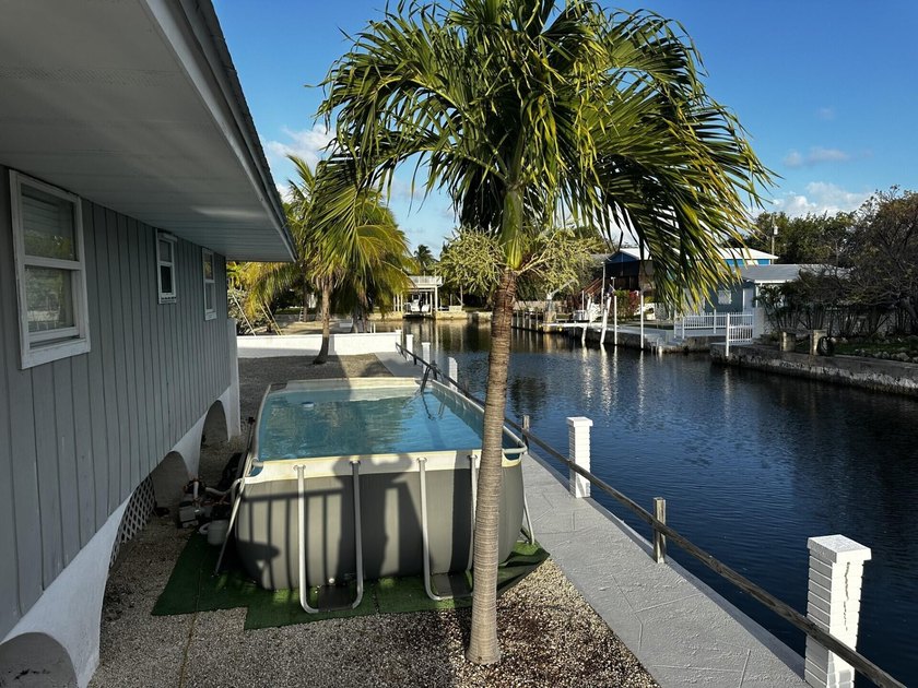 Bring your boats to this beautifully furnished canal front home - photo 20