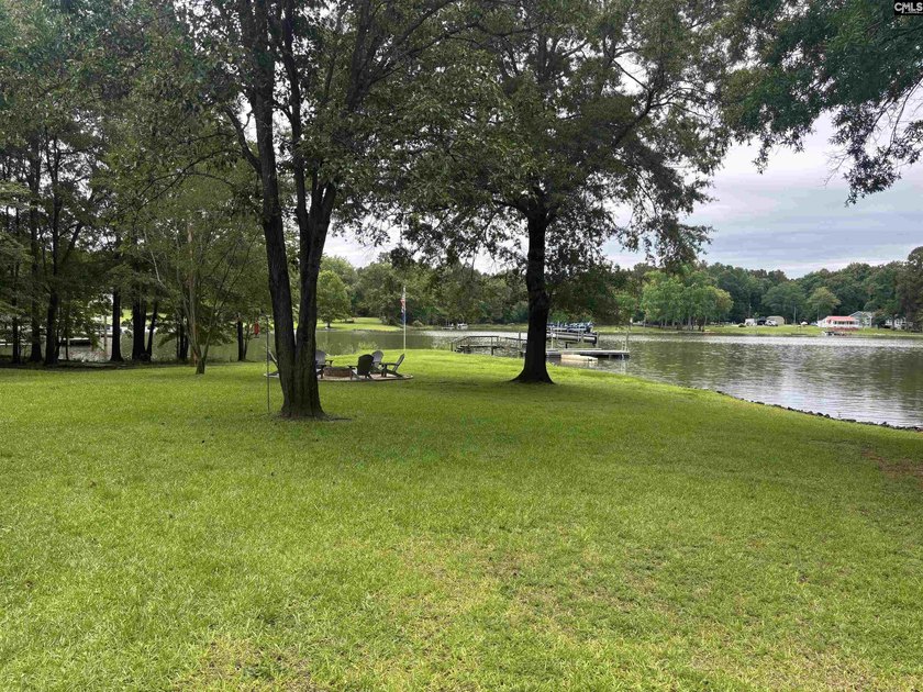 Lake time perfected in this 3 bedroom lake cabin! Large - photo 3