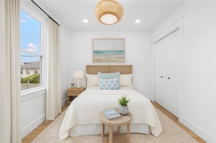 Thoughtfully renovated two-unit multi-family home with an - photo 13