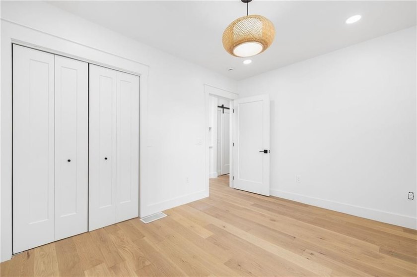 Thoughtfully renovated two-unit multi-family home with an - photo 15