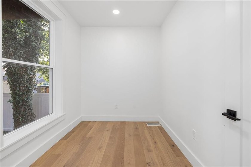 Thoughtfully renovated two-unit multi-family home with an - photo 16