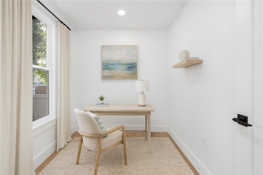 Thoughtfully renovated two-unit multi-family home with an - photo 18