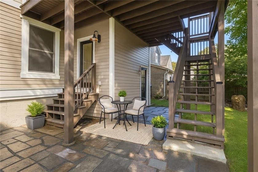 Thoughtfully renovated two-unit multi-family home with an - photo 23