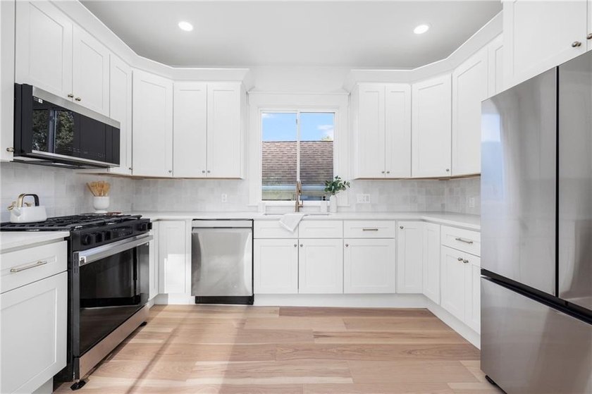 Thoughtfully renovated two-unit multi-family home with an - photo 32