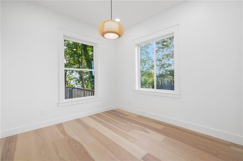 Thoughtfully renovated two-unit multi-family home with an - photo 34