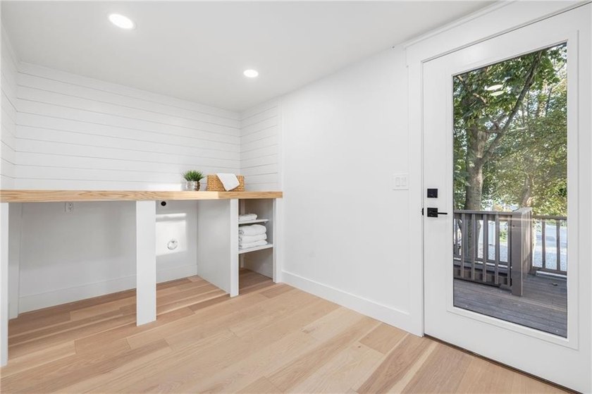 Thoughtfully renovated two-unit multi-family home with an - photo 38