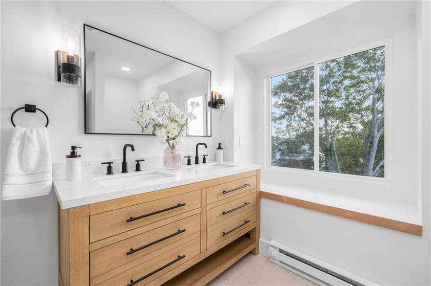 Thoughtfully renovated two-unit multi-family home with an - photo 47