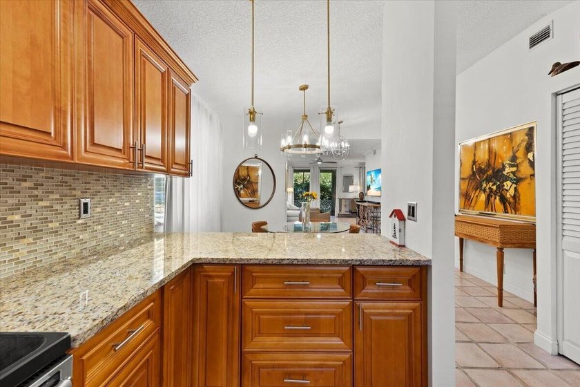 Behind the gates of Boca Pointe, this 3BR/3BA corner townhome - photo 15