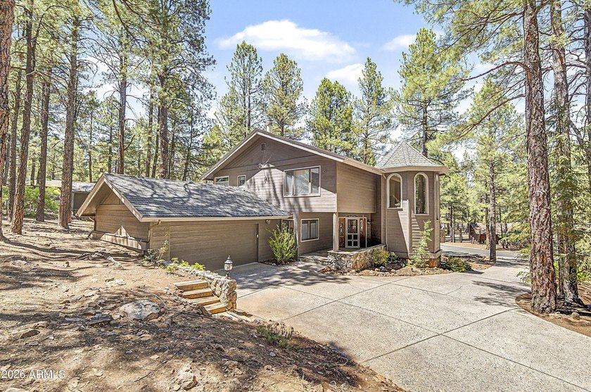 Majestic home perched on a large custom lot with tons of windows - photo 7