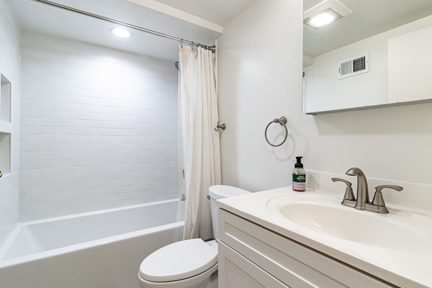 Bright, south-facing and ideally located, this thoughtfully - photo 11