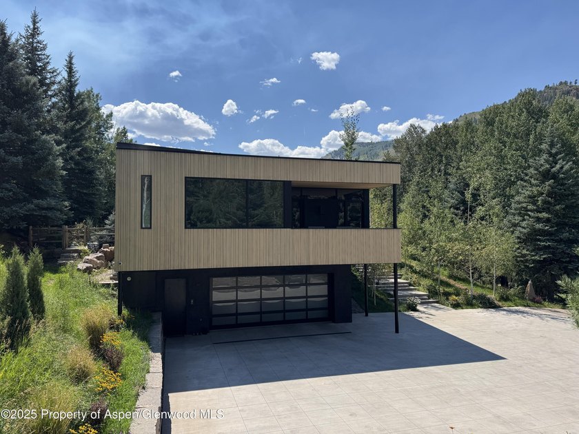 A landmark of contemporary mountain architecture, this - photo 42