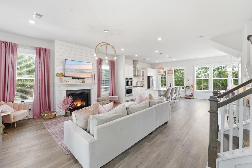 Welcome to this stunning elevated marsh front home on The Island - photo 12