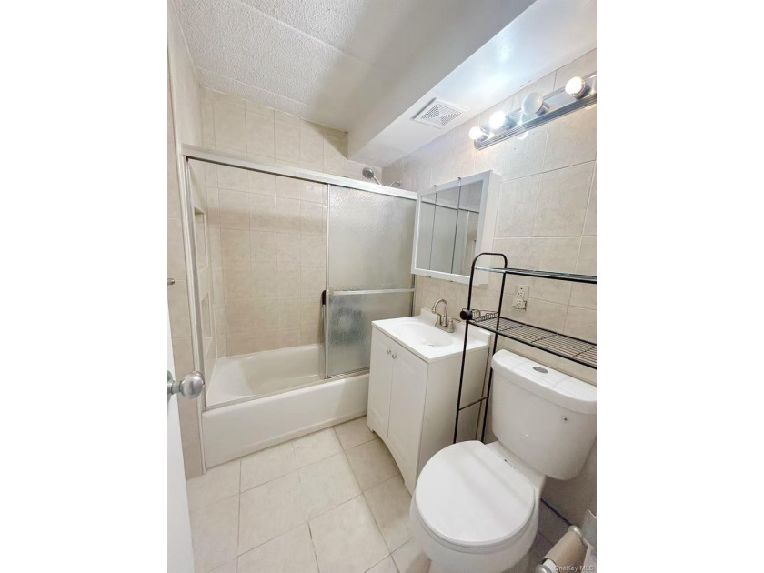 Welcome to SUNRISE TOWER in the Heart of Downtown Flushing! This - photo 8