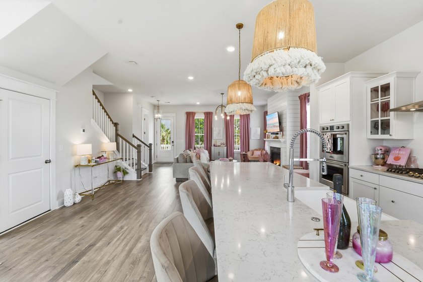 Welcome to this stunning elevated marsh front home on The Island - photo 22