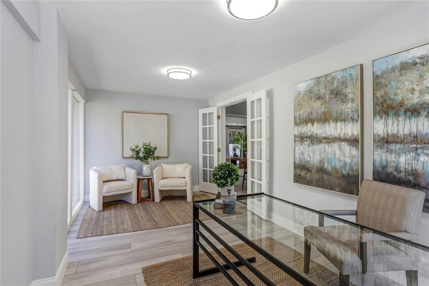 Step into this exquisitely renovated 1925 residence, where - photo 22