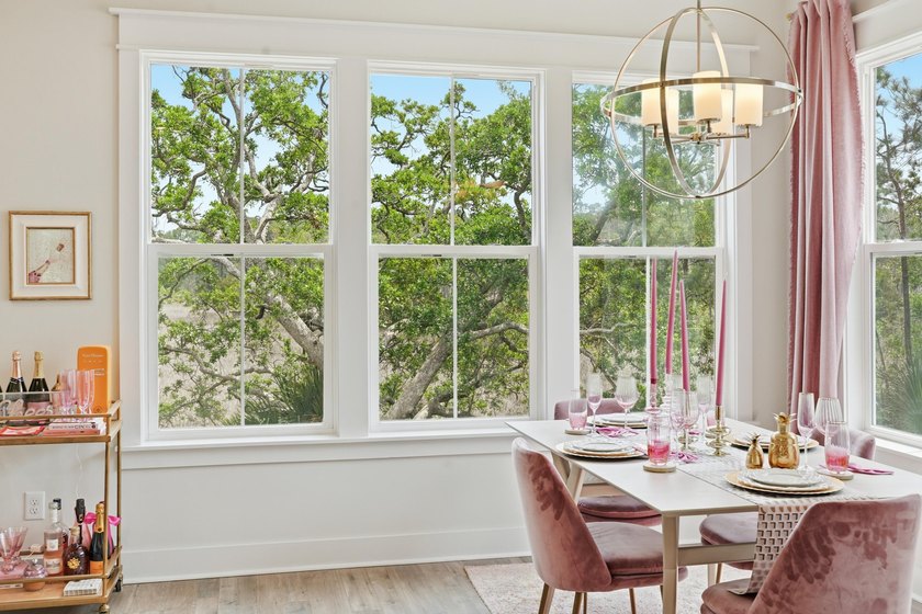 Welcome to this stunning elevated marsh front home on The Island - photo 30