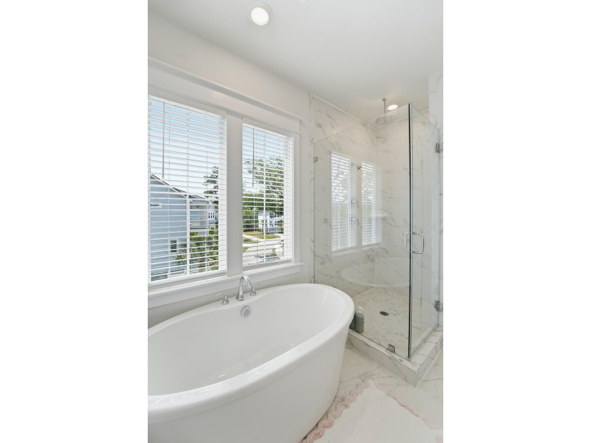Welcome to this stunning elevated marsh front home on The Island - photo 41