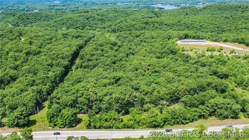 Prime highway front acreage ready for building a new commercial - photo 11