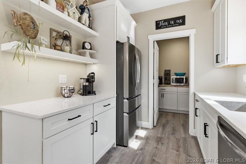 Experience the best of lakefront living at the 1-mile marker in - photo 13