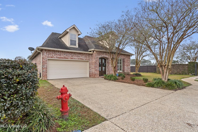 This immaculately maintained 3-bedroom, 2.5-bath home is nestled - photo 3