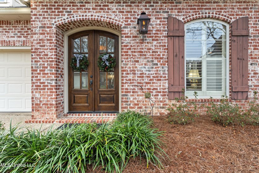 This immaculately maintained 3-bedroom, 2.5-bath home is nestled - photo 4