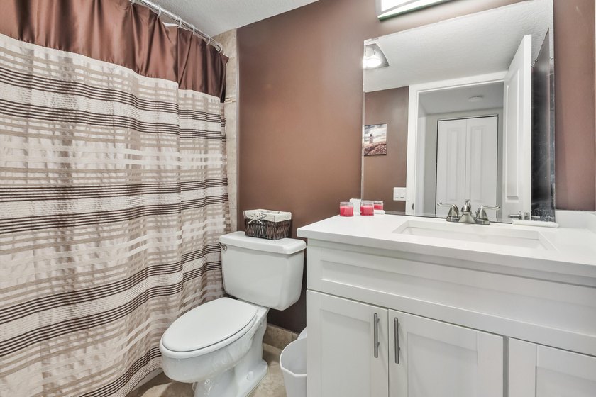 Beautifully renovated 2-bedroom, 2-bathroom first-floor condo in - photo 16