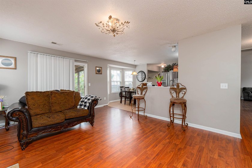 Welcome to 909 Murchison Drive! This spacious 3-bedroom, 2 - photo 6