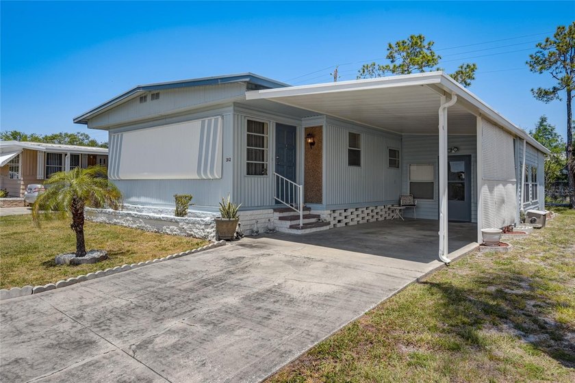 Welcome to Terra Ceia Manor, a quaint 55+ manufactured home - photo 3